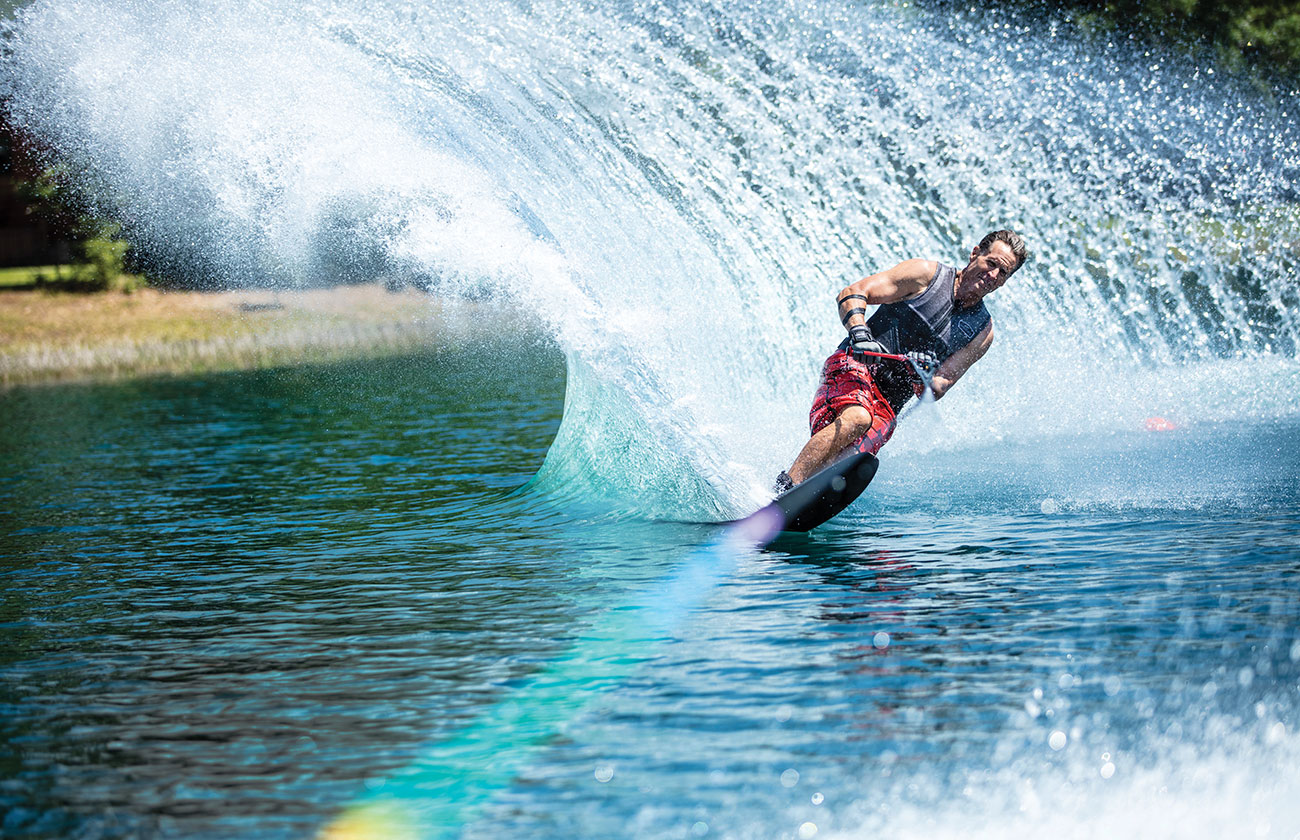 Man water skiing on a lake